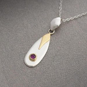 Garnet pendant made of sterling silver and 9ct gold by iana jewellery