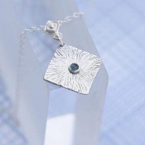 Topaz Pendant, silver pendant with blue Topaz in the centre made by Ian Caird of iana Jewellery