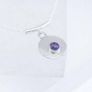 round silver pendant with Amethyst in the centre, Amethyst Pendant