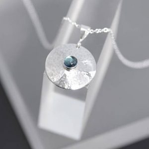 Topaz Pendant made of round sterling silver with hammered finish by Ian Caird of iana Jewellery