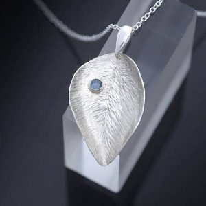 leaf shape Blue Topaz Pendant made in silver by Ian Caird of iana Jewellery