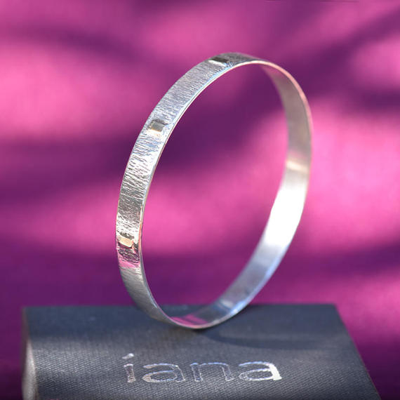 silver and gold bangle